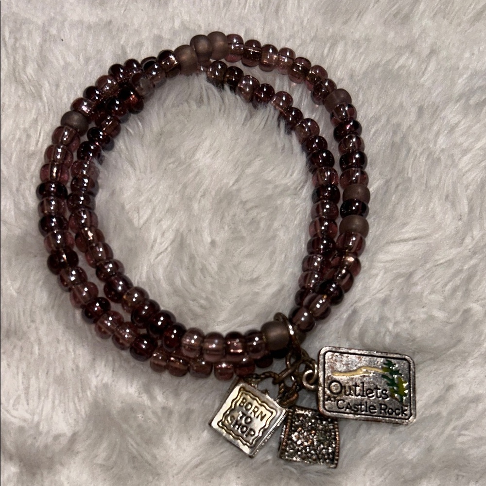 Elegant Beaded Bracelet with Charms